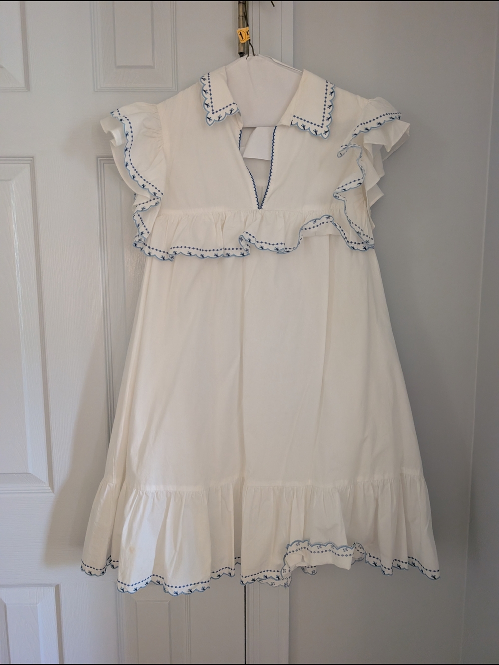 White Ruffled Dress with Blue Trim